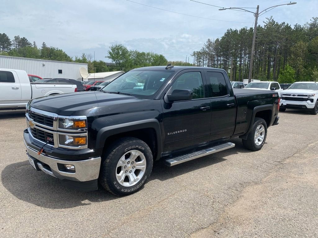 2015 Chevrolet Silverado 1500 LT in Black — front three-quarter view