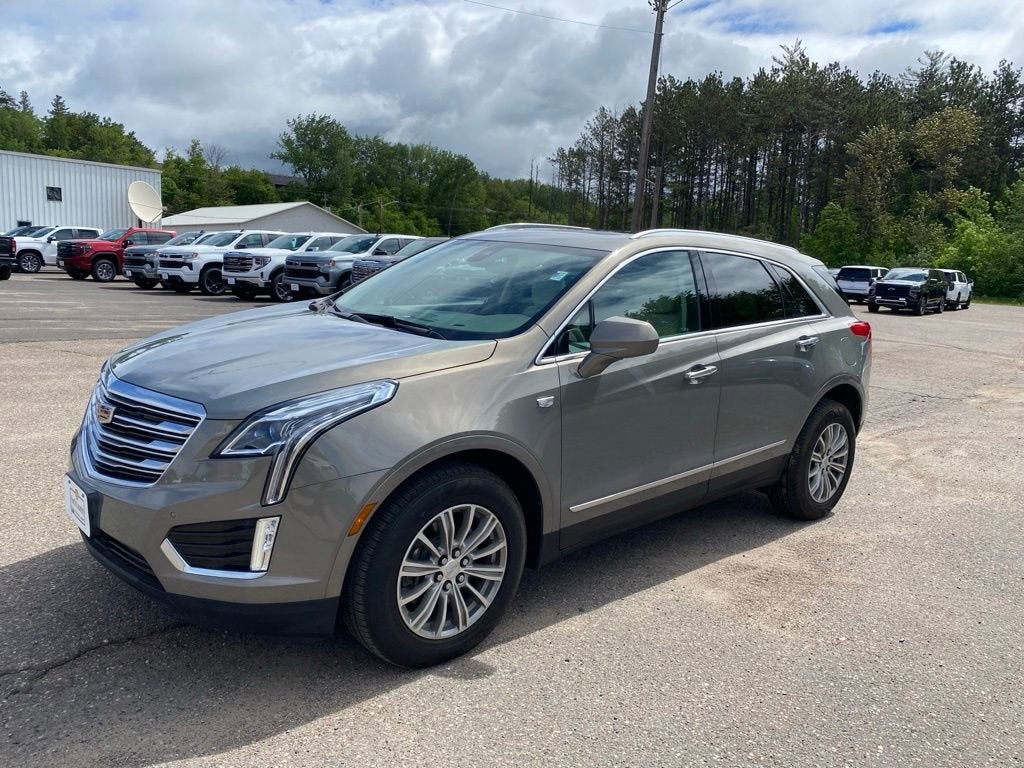 2018 Cadillac XT5 Luxury AWD in Bronze Dune Metallic — front three-quarter view