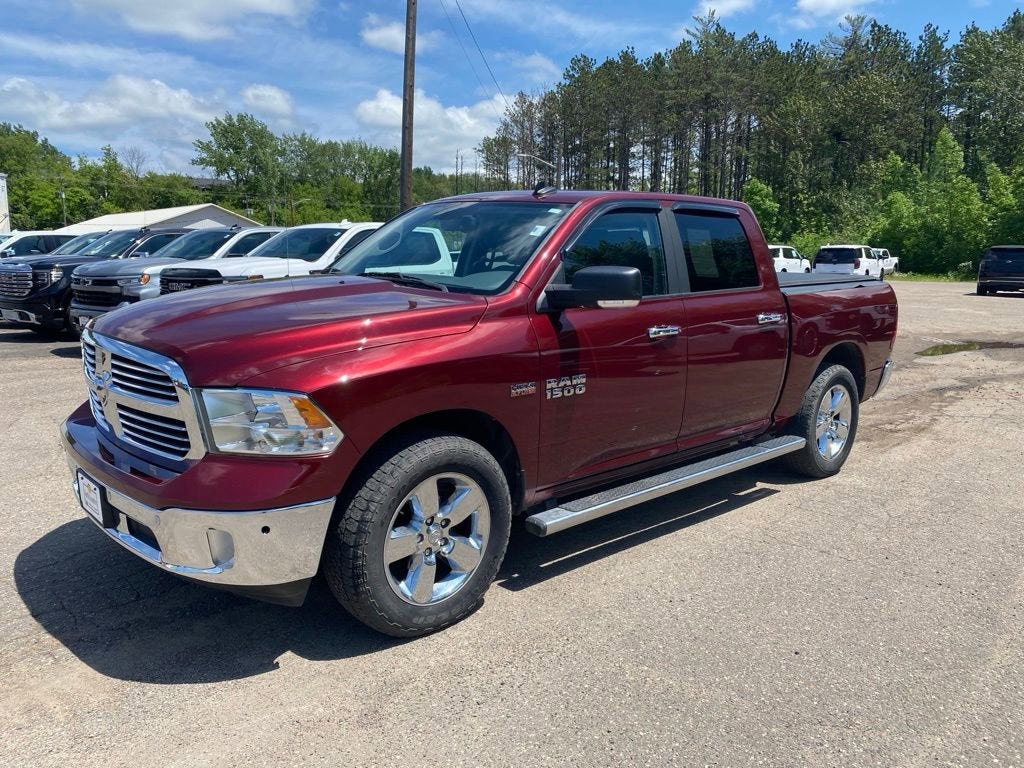 2017 RAM 1500 Big Horn in Red — front three-quarter view