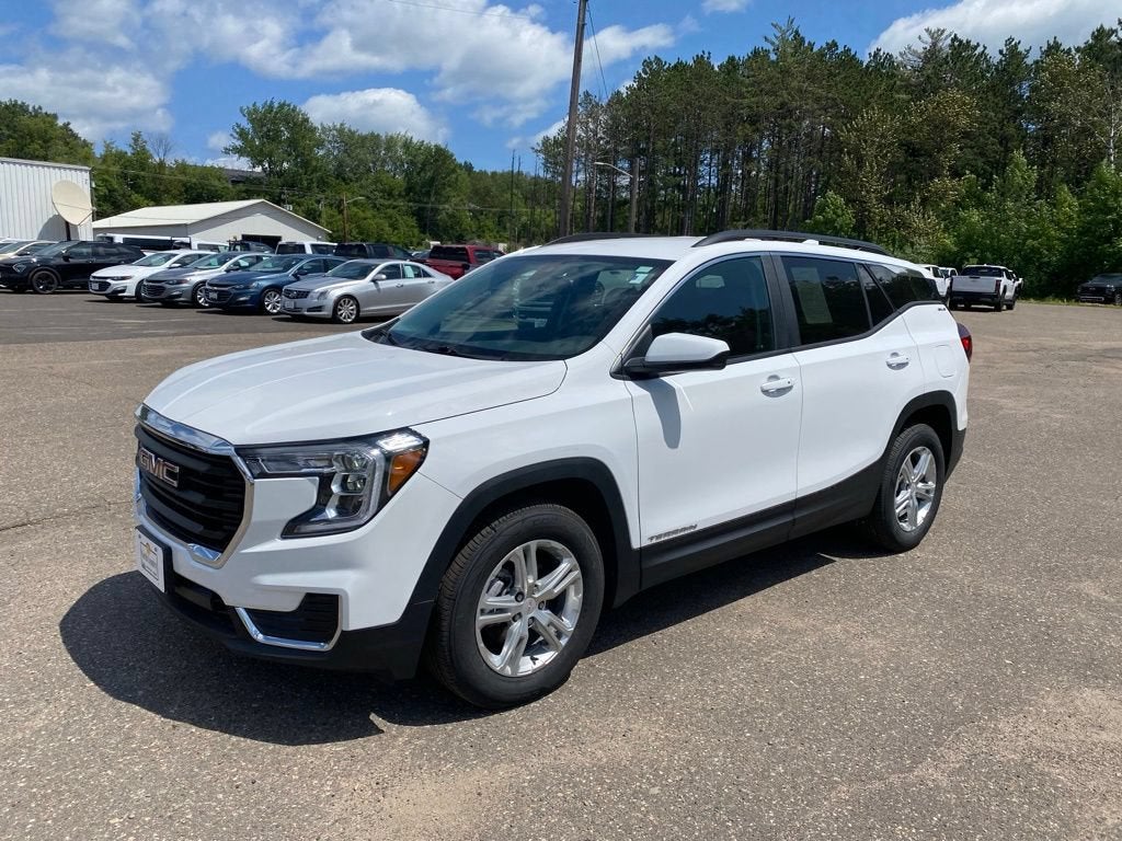 2023 GMC Terrain SLE in Summit White — front three-quarter view